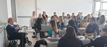 Gandel Holocaust Program participants listening to the testimony of Holocaust survivor Rena Quint during their seminar at Yad Vashem, Israel, in January 2023.